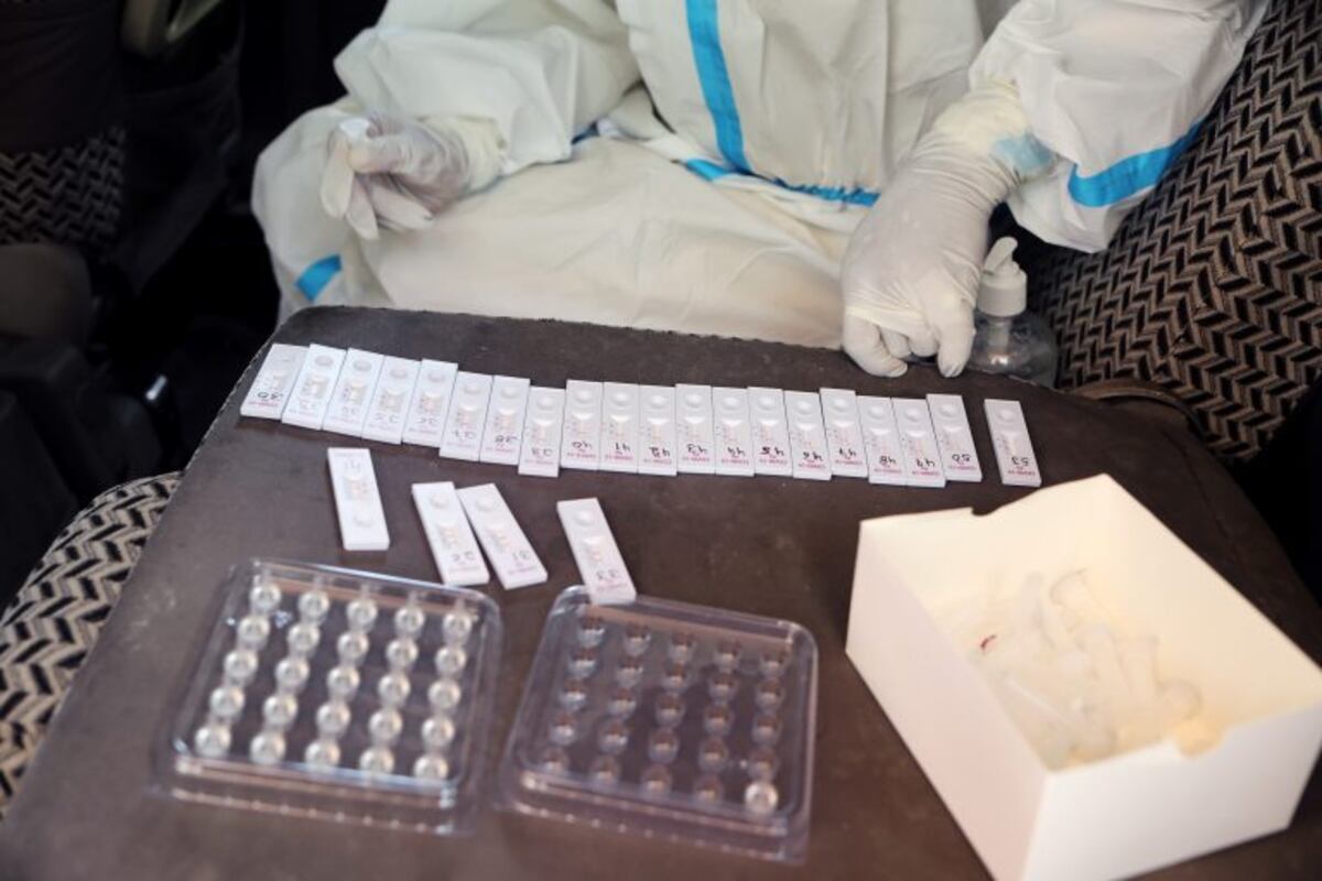 A health worker conducts rapid-antigen methodology Covid-19 tests from a testing vehicle at a healthcare center in New Delhi, India, Monday, July 27, 2020\u002E India's coronavirus epidemic is now growing at the fastest in the world, increasing 20% over the last week to more than 1\u002E4 million confirmed cases, according to Bloomberg's Coronavirus Tracker\u002E Photographer: T\u002E Narayan/Bloomberg