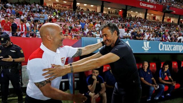 Sevilla coach Jorge Sampaoli, left, and Barcelona coach Luis Enrique greet each other before a Spanish Super Cup first-leg soccer at Ramon Sanchez-Pizjuan stadium in Seville, Spain, Sunday, Aug. 14, 2016. (AP Photo/Antonio Pizarro) espau00f1a Jorge Sampaoli L
