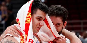 Basketball - FIBA World Cup - Semi Finals - Argentina v France - Wukesong Sport Arena, Beijing, China - September 13, 2019  Argentina's Gabriel Deck and Patricio Garino celebrate victory after the match REUTERS/Kim Kyung-Hoon