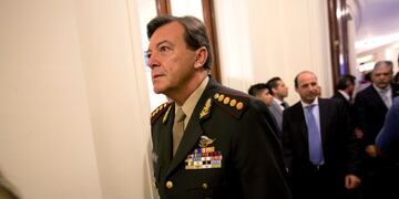 FILE - In this March 1, 2015 file photo, Gen\u002E Cesar Milani arrives to Congress for the inauguration ceremony of the 2015 legislative year in Buenos Aires, Argentina\u002E “On Friday August 9, 2019, a court in the Argentine province of La Rioja found Milani not guilty of the crimes of kidnapping and torture during the 1976-1983 for which he was sent to trial”\u002E (AP Photo/Rodrigo Abd, File)