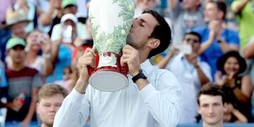 MASON, OH - AUGUST 19: Novak Djokovic of Serbis celebrates his win over Roger Federer of Switzerland during the men's final of the Western & Southern Open at Lindner Family Tennis Center on August 19, 2018 in Mason, Ohio\u002E Matthew Stockman/Getty Images/AFP\n== FOR NEWSPAPERS, INTERNET, TELCOS & TELEVISION USE ONLY ==