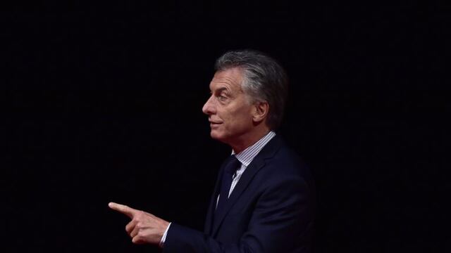 Argentina's President Mauricio Macri gestures before receiving  receiving the Nueva Economia Forum prize for debating during an award ceremony at the Teatro Real in Madrid on February 24, 2017.rnArgentinian President Mauricio Macri, on a four day official