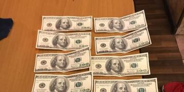 Intentó comprar un celular con dólares falsos\u002E