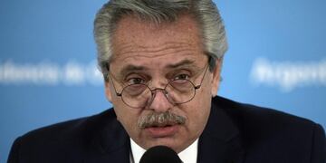 (FILES) In this file photo taken on August 12, 2020 Argentine President Alberto Fernandez speaks during a press conference at the presidential residence in Olivos, Buenos Aires province\u002E - Argentina formally opened consultations with the International Monetary Fund on August 26, 2020 to agree new terms on the repayment of a $57 billion bailout agreed in 2018\u002E (Photo by JUAN MABROMATA / AFP)