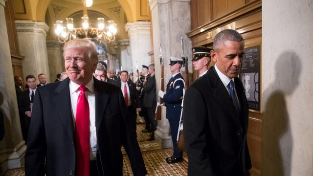 FILE PHOTO - President-elect Donald Trump, left, and President Barack Obama arrive for Trump's inauguration ceremony at the Capitol in Washington, D.C., U.S. January 20, 2017. REUTERS/J. Scott Applewhite/Pool/File Photo