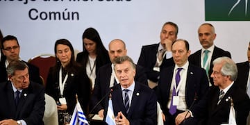 FILE - In this Dec\u002E 18, 2018 file photo, Argentina's President Mauricio Macri speaks as the new pro tempore president of Mercosur, flanked by Uruguay's Foreign Affairs Minister, Rodolfo Nin, left and Uruguay's President Tabare Vazquez, right, at the 53rd Mercosur Summit in Montevideo, Uruguay\u002E Argentina's Foreign Ministry said in a statement Friday, June 28, 2019, that South America's Mercosur trade bloc has struck a \