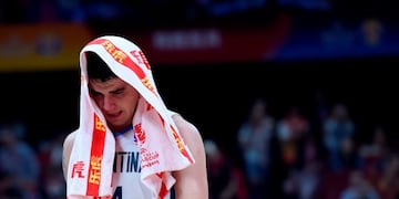 Argentina's Gabriel Deck reacts after their team lost against Spain at the Basketball World Cup final game in Beijing on September 15, 2019\u002E (Photo by WANG ZHAO / AFP)