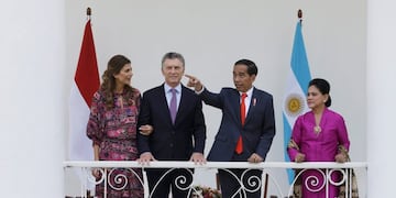 Indonesian President Joko Widodo, second from right, talks to Argentine President Mauricio Macri as Argentine first lady Juliana Awada, left, and Widodo's wife Iriana listen during their meeting at the presidential palace in Bogor, West Java, Indonesia, Wednesday, June 26, 2019\u002E (AP Photo/Achmad Ibrahim)