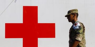A soldier is seen at the military mobile hospital that will care for patients infected with coronavirus disease (COVID-19) in San Miguel, on the outskirts of Buenos Aires, Argentina March 24, 2020\u002E REUTERS/Matias Baglietto