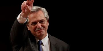 FILE - In this Nov\u002E 5, 2019 file photo, Argentina's President-elect Alberto Fernandez gestures to supporters as he arrives to give a talk on the challenges facing Latin America, hosted by Mexico's National Autonomous University in Mexico City\u002E Fernandez becomes president of Argentina on Tuesday Dic\u002E 10, returning the country's Peronist political movement to power amid an economic crisis and rising poverty\u002E (AP Photo/Rebecca Blackwell, File)