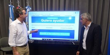 Pablo Javkin y Franco Bartolacci con plataforma de ayuda por coronavirus (Municipalidad de Rosario)