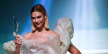 US model Karlie Kloss presents a creation by Jean Paul Gaultier during the Women's Spring-Summer 2020 Haute Couture collection fashion show in Paris, on January 22, 2020\u002E (Photo by Anne-Christine POUJOULAT / AFP)