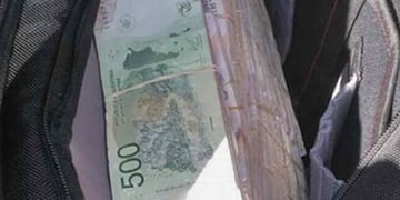 Bolso con dinero.