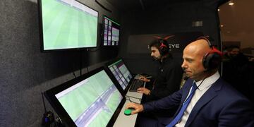 (FILES) In this file photo taken on January 9, 2018 French refeere Amaury Delerue (front) takes part in a presentation of video assisted refereeing (VAR) before the French League Cup football match between Nice and Monaco at the Allianz Riviera Stadium in Nice, southern France\u002E\nThe management of the 32 teams qualified for the World Cup-2018 in Russia were rather confident February 28 about the video assistance to the arbitration (VAR), whose Fifa must decide March 3 of the use during the competition\u002E / AFP PHOTO / VALERY HACHE