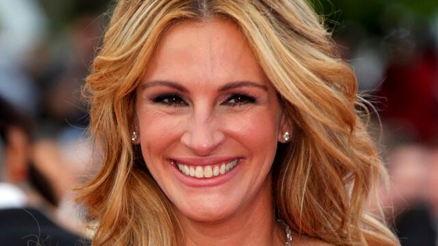 Cast member Julia Roberts poses on the red carpet as she arrives for the screening of the film