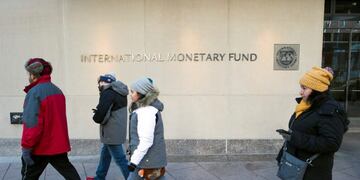 The International Monetary Fund (IMF) headquarters is seen Monday, Dec. 19, 2016, in Washington. The International Monetary Fund's managing director, Christine Lagarde, was convicted Monday of negligence by a special French court for her role in a contentious and generous arbitration award in 2008 to a politically connected tycoon. The Washington-based IMF said after Monday's verdict that its executive board would meet soon