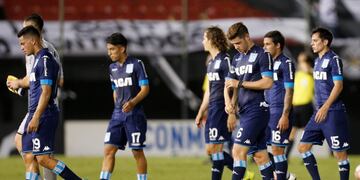 Argentina's Racing Club players leave the field after losing 1-0 to Paraguay's Libertad at the end of a Copa Sudamericana soccer game in Asuncion, Paraguay, Tuesday, Oct\u002E 24, 2017\u002E(AP Photo/Jorge Saenz)