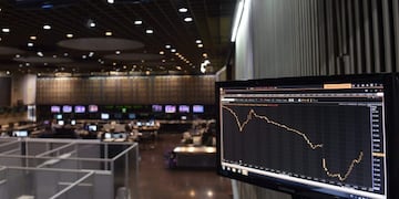 Impuesto a la renta financiera\u002E (AFP PHOTO / JUAN MABROMATA)\u002E