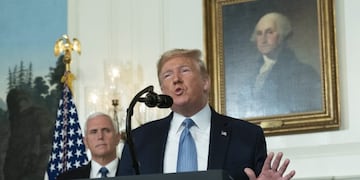 August 5, 2019 - Washington, DC, United States: United States President Donald J\u002E Trump makes a statement at the White House in Washington, DC in response to two separate shooting incidents, August 5, 2019\u002E United States Vice President Mike Pence listens\u002E (Chris Kleponis / CNP / Polaris)
