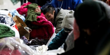 Homeless people receive donations at Argentine soccer team River Plate's stadium in Buenos Aires, Argentina, July 3, 2019\u002E REUTERS/Agustin Marcarian