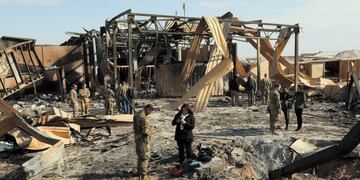 January 13, 2020 - Al Asad Air Base, Iraq: Media outlets visit one of the many impact sites created by the recent missile attacks at Al Asad Air Base\u002EMultiple international news agencies were invited by military officials to participate in a media event at Al Asad due to the recent ballistic missile attacks\u002E (Derek Mustard / US Army / Polaris)