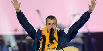 In this Sunday, June 4, 2017, handout photo provided by Dave Hogan for One Love Manchester, singer Justin Bieber performs at the One Love Manchester tribute concert in Manchester, north western England, Sunday, June 4, 2017. One Love Manchester is raising money for those affected by the bombing at the end of Ariana Grande's concert in Manchester on May 22, 2017. (Dave Hogan via AP)