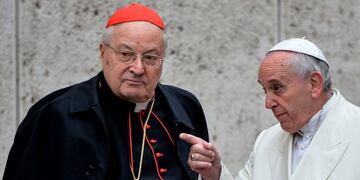 (FILES) In this file photo taken on February 13, 2015 Pope Francis (R) speaks with Italian cardinal Angelo Sodano, as he arrives to take part with cardinals and bishops in the Papal consistory before the nominations of new cardinals, at the Vatican\u002E - Pope Francis on December 21, 2019 has accepted the resignation of the former Secretary of State and Dean of the College of Cardinals, Angelo Sodano, and with a special Motu proprio, established new guidelines for the role of the Dean\u002E (Photo by Andreas SOLARO / AFP)