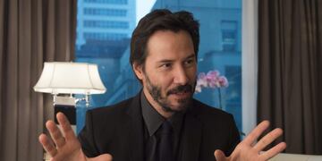 Actor Keanu Reeves gestures during an interview with The Canadian Press in Toronto on Monday October 20, 2014\u002E Reeves stars in the new movie, \