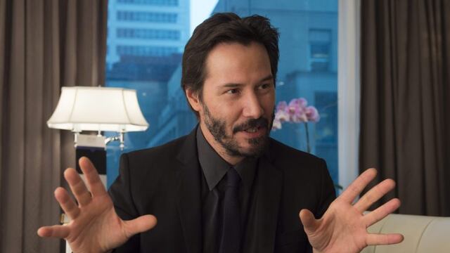 Actor Keanu Reeves gestures during an interview with The Canadian Press in Toronto on Monday October 20, 2014\u002E Reeves stars in the new movie, \