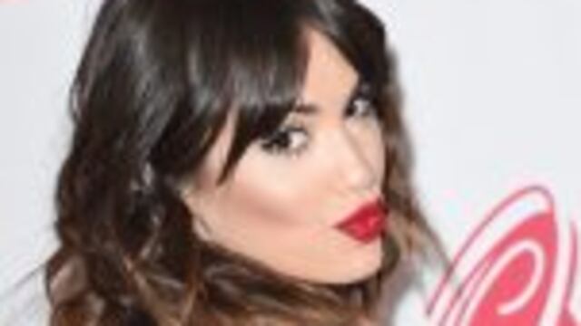 Lali imitu00f3 a Tini.