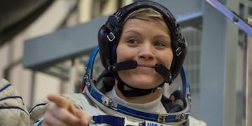 (FILES) In this file photo taken on November 14, 2018 NASA astronaut Anne McClain, a member of the International Space Station (ISS) expedition 58/59, attends her final exam at the Gagarin Cosmonauts' Training Centre in Star City outside Moscow\u002E - US space agency NASA is investigating what may be the first crime committed in outer space, The New York Times reported on August 24, 2019\u002E Astronaut Anne McClain is accused of identity theft and improperly accessing her estranged wife's private financial records while on a sixth-month mission aboard the International Space Station (ISS), the Times said\u002E (Photo by STR / AFP)