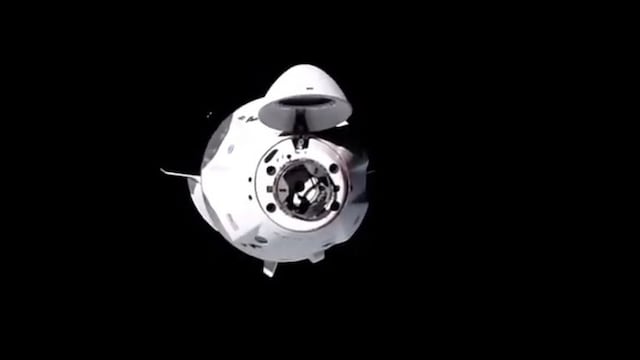 This NASA TV video grab shows Nasa's SpaceX Crew-1 mission aboard the SpaceX Crew Dragon as it approaches the International Space Station (out of frame) on November 16, 2020\u002E - Four astronauts were successfully launched on the SpaceX Crew Dragon \