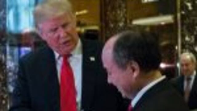 (FILES) This file photo taken on December 6, 2016 showsnPresident-elect Donald Trump exits elevators with SoftBank Group Corp. founder and Chief Executive Officer Masayoshi Son in the lobby of Trump Tower after meetings in New York.nSatellite broadband firm OneWeb on December 19, 2016 announced a $1.2 billion funding round led by SoftBank, the first concrete investment from the Japanese group which made a pledge to President-elect Donald Trump. / AFP PHOTO / EDUARDO MUNOZ ALVAREZ