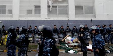 Hundreds of police and security agents with anti-riot gear gather outside the PepsiCo plant on the outskirts of Buenos Aires, Argentina, Thursday, July 13, 2017\u002E Security forces clashed Thursday with former PepsiCo employees after resisting eviction from the plant\u002E Workers had occupied the plant after PepsiCo closed the plant last month for logistical reasons\u002E (AP Photo/Natacha Pisarenko)