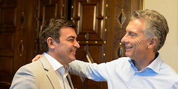 Omar De Marchi y Mauricio Macri.