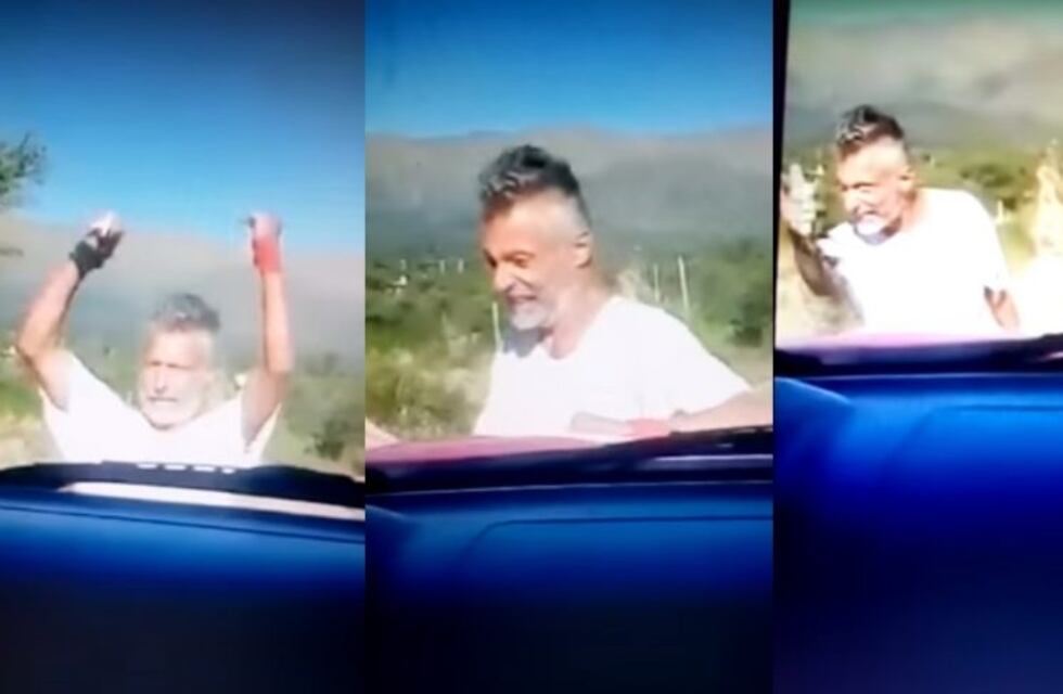 Desquiciado: mirá cómo un hombre agrede a sus vecinos porque no quiere que pasen por la calle