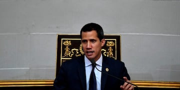 Venezuela's opposition leader and self-proclaimed interim president Juan Guaido speaks during an extraordinary session for the the anniversary of the Venezuelan Independence at the National Assembly in Caracas on July 5, 2019\u002E (Photo by Federico Parra / AFP)