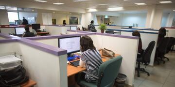Ultra-Orthodox Jewish women work on computers at their desks in the Comax software company office in the central city of Holon near Tel Aviv on April 17, 2016\u002E \r\nThe company in Holon near Tel Aviv employs 20 ultra-Orthodox women, one of several to do so as increasingly more female breadwinners from Israel's religious community join the secular work force\u002E Graduates of programming schools in the overwhelmingly ultra-Orthodox community of Bnei Brak, about 10 kilometres (six miles) away, the Comax women produce most of the firm's computer programmes for large supermarkets in the vicinity\u002E\r\n\r\n\r\n\r\n\r\n\r\n / AFP PHOTO / MENAHEM KAHANA / TO GO WITH AFP STORY BY DELPHINE MATTHIEUSSENT israel holon  israel mujeres trabajando en empresa informatica Comax mujeres judias ultra ortodoxas trabajando trabajo trabajadores