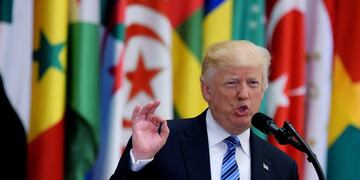 (FILES) This file photo taken on May 21, 2017 shows US President Donald Trump speaking during the Arab Islamic American Summit at the King Abdulaziz Conference Center in Riyadh\u002E\nUS President Donald Trump on June 6, 2017 linked Arab moves to isolate Qatar to his recent Middle East trip, showing little sympathy for the plight of the Gulf emirate despite its role as a hub for US military operations in the region\u002E \