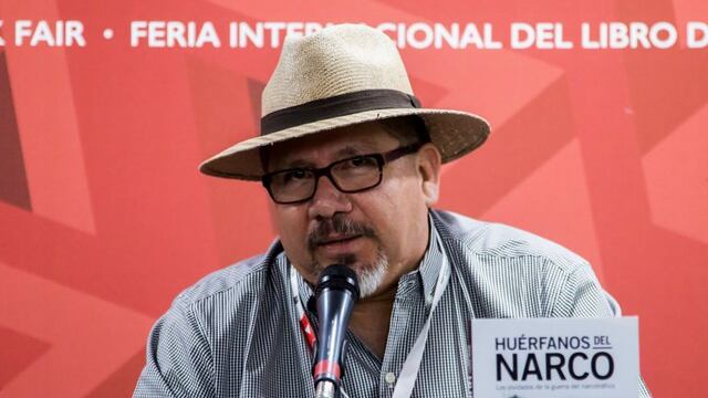 This file photo taken on November 27, 2016 shows Mexican journalist Javier Valdez speaking during the presentation of his book