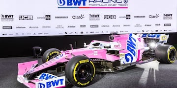 TOPSHOT - The RP20 Formula one car of team BWT Racing Point F1 is displayed during a press presentation in Mondsee, Austria on February 17, 2020\u002E (Photo by Johann GRODER / various sources / AFP) / Austria OUT