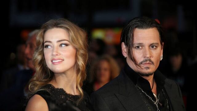 FILE - In this Oct\u002E 11, 2015 file photo, Amber Heard, left, and Johnny Depp arrive at the premiere of Depp's film \