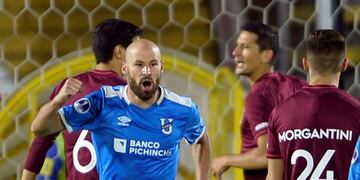 Ecuador's Universidad Catolica player Juan Tevez celebrates after scoring against Argentina's Lanus during their Copa Sudamericana football match at Olimpico Atahualpa stadium in Quito on February 26, 2020\u002E (Photo by Cristina Vega RHOR / AFP)