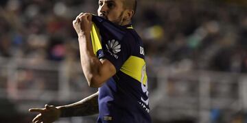 Picture released by Telam showing Boca Juniors' forward Dario Benedetto celebrating after scoring the team's second goal against Olimpo during the Argentine First Division football match at Roberto Natalio Carminatti stadium in Bahia Blanca, Buenos Aires on June 21, 2017\u002E \nBoca Juniors became champion of the 2016-2017 Argentine First Division football competition\u002E / AFP PHOTO / AGENCIA TELAM / ALEJANDRO SANTA CRUZ