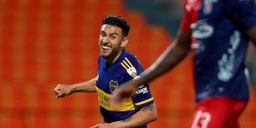 Argentina's Boca Juniors Eduardo Salvio celebrates after scoring against Colombia's Independiente Medellin during the closed-door Copa Libertadores group phase football match at the Atanasio Girardot Stadium in Medellin, Colombia, on September 24, 2020, amid the COVID-19 novel coronavirus pandemic\u002E (Photo by Fernando Vergara / POOL / AFP)