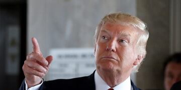 FILE u2013 In this Aug. 16, 2016, file photo, Republican presidential candidate Donald Trump gestures during a campaign stop at the Milwaukee County War Memorial Center in Milwaukee, Wis. Countless former Democrats in Ohio's blue-collar Mahoning Valley are transferring their adoration for late U.S. Rep. James A. Traficant Jr., D-Ohio, to Trump, while those who knew Traficant say similarities between him and Trump end at the populist bravado and outsized hair. (AP Photo/Gerald Herbert, File)