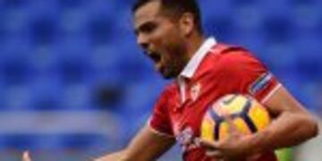 Sevilla's Argentinian defender Gabriel Mercado celebrates his teammate forward Vitolo's goal during the Spanish league football match between RC Deportivo de la Coruna and Sevilla FC at the Municipal de Riazor stadium in La Coruna, on November 19, 2016. / AFP PHOTO / MIGUEL RIOPA
