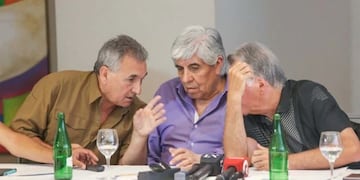 Juan Carlos Schmid, Hugo Moyano y Luis Barrionuevo