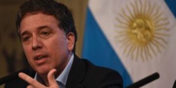Argentina's new Finance Minister Nicolas Dujovne offers a press conference at the Casa Rosada presidential palace in Buenos Aires, on December 30, 2016.rnArgentine President Mauricio Macri sacked his finance minister Alfonso Prat-Gay on Monday and split t