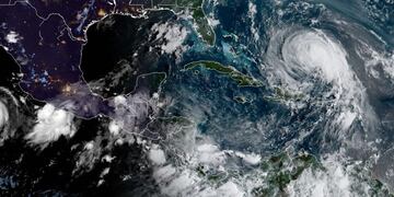 This satellite image obtained from the National Oceanic and Atmospheric Administration (NOAA) shows Hurricane Max (L) and Hurricane Jose (R) on September 14, 2017, at 1230UTC\u002E \n\nMax formed off the southwestern coast of Mexico on Thursday, triggering warnings of life-threatening storm conditions for a long stretch of coastal communities including the resort city of Acapulco, forecasters said\u002E As of 7:00 am (1200 GMT), the Category One storm had top winds of 75 miles (121 kilometers) per hour and was moving east at six miles per hour, according to the Miami-based National Hurricane Center\u002E\n / AFP PHOTO / NOAA/RAMMB / HO / RESTRICTED TO EDITORIAL USE - MANDATORY CREDIT \
